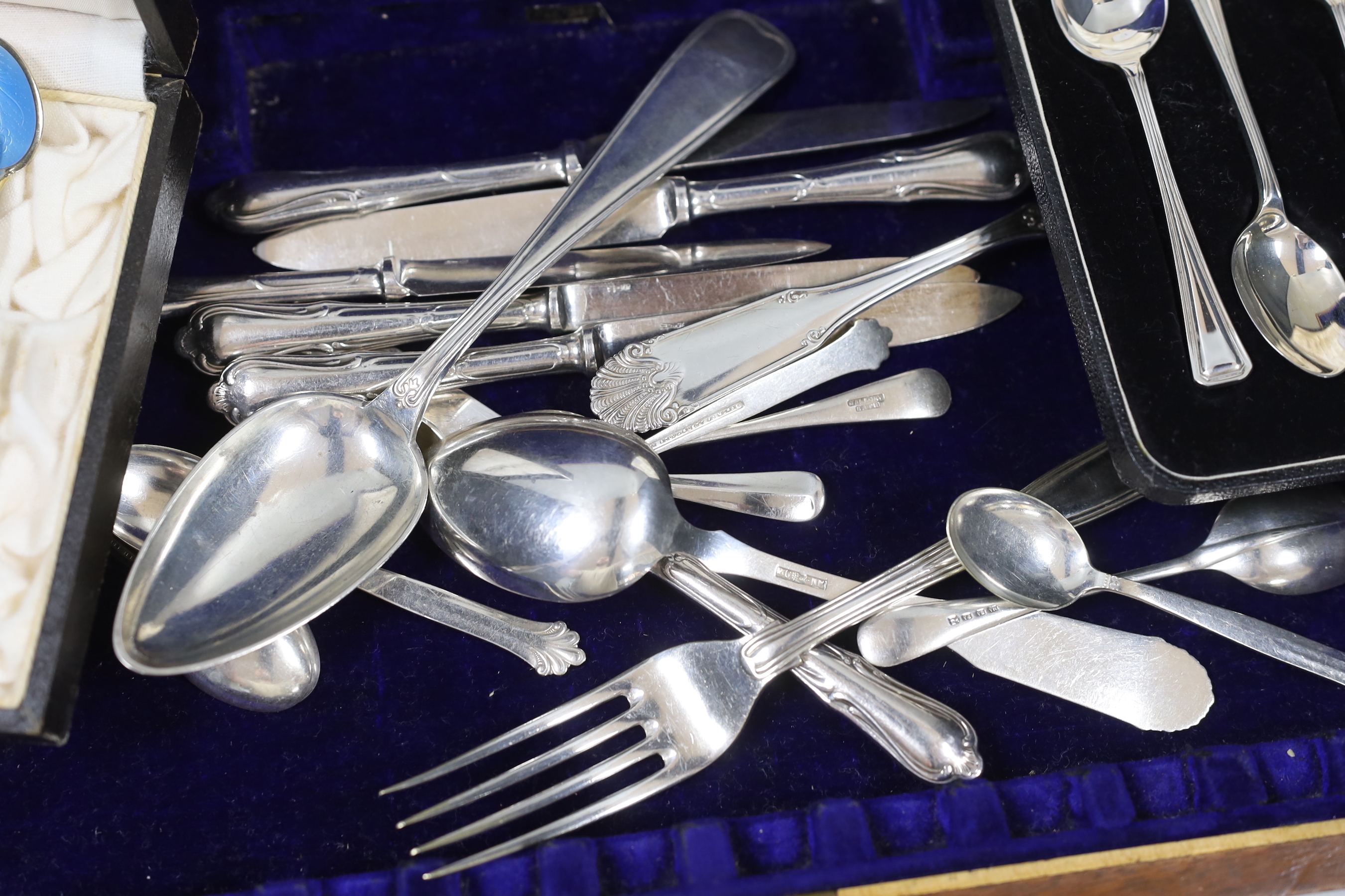 A cased set of six Norwegian 925S and enamelled coffee spoons, a cased set of six silver teaspoons and other assorted flatware including white metal.